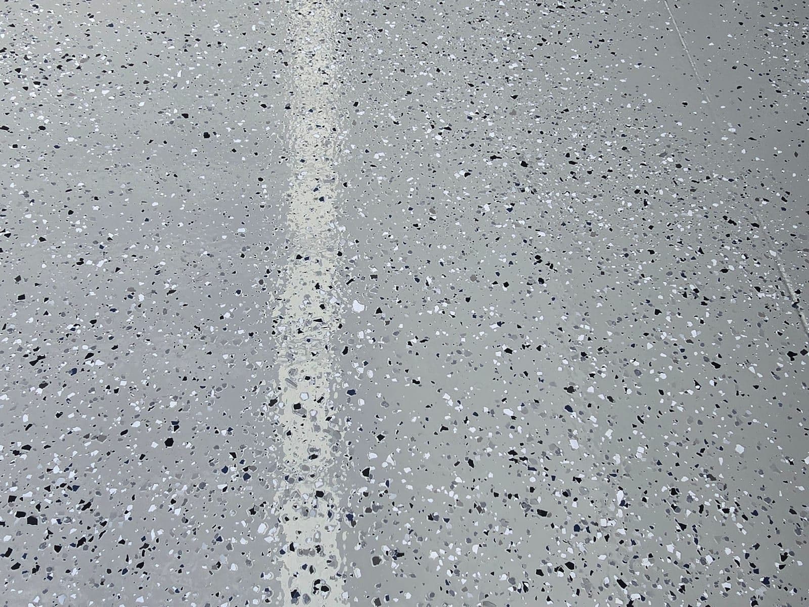 Flake epoxy floor with a wet, glossy sheen