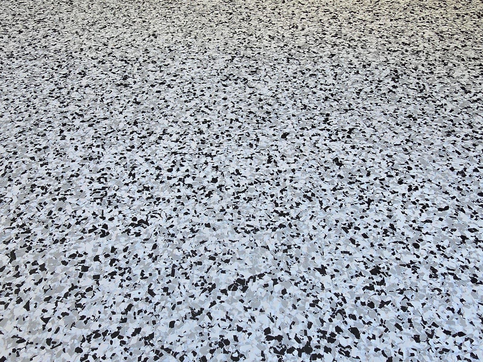 Flake epoxy floor finish in a residential carport